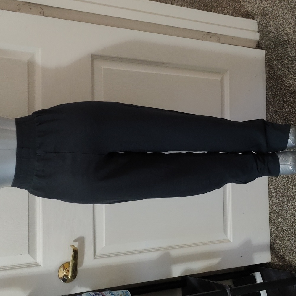 Fabletics size M dark green joggers with zipper cuff